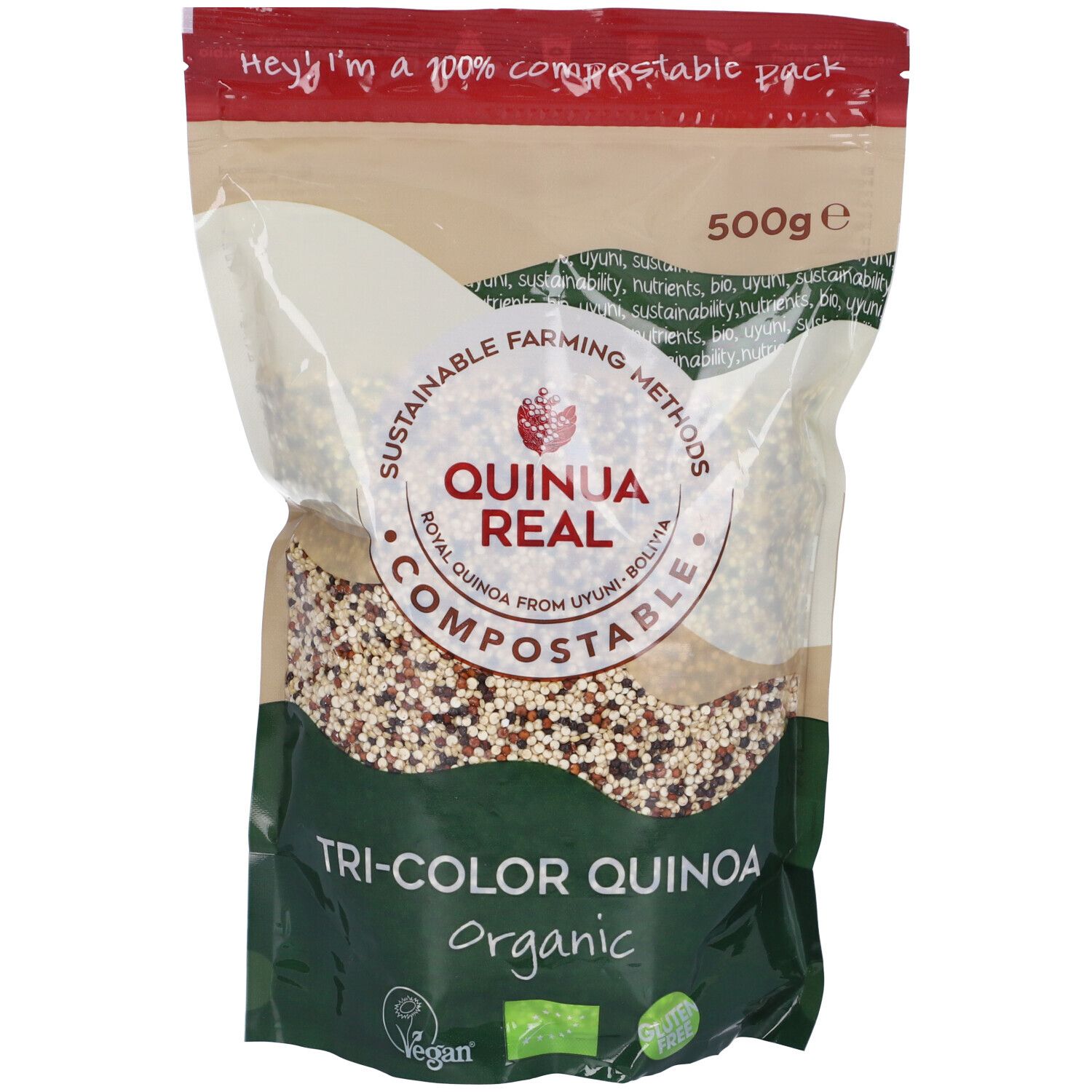 Busta di Quinua Real Tri-Color Quinoa. 500g. Testo: 'Sustainable farming methods'. 'Compostable' e 'Organic'. Sigillo vegano.