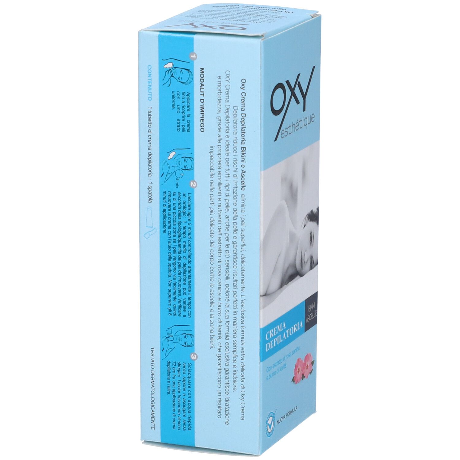 Confezione Oxy esthetique Crema Depilatoria. Blu chiaro, nome prodotto, immagine e testo. Fiori rosa.