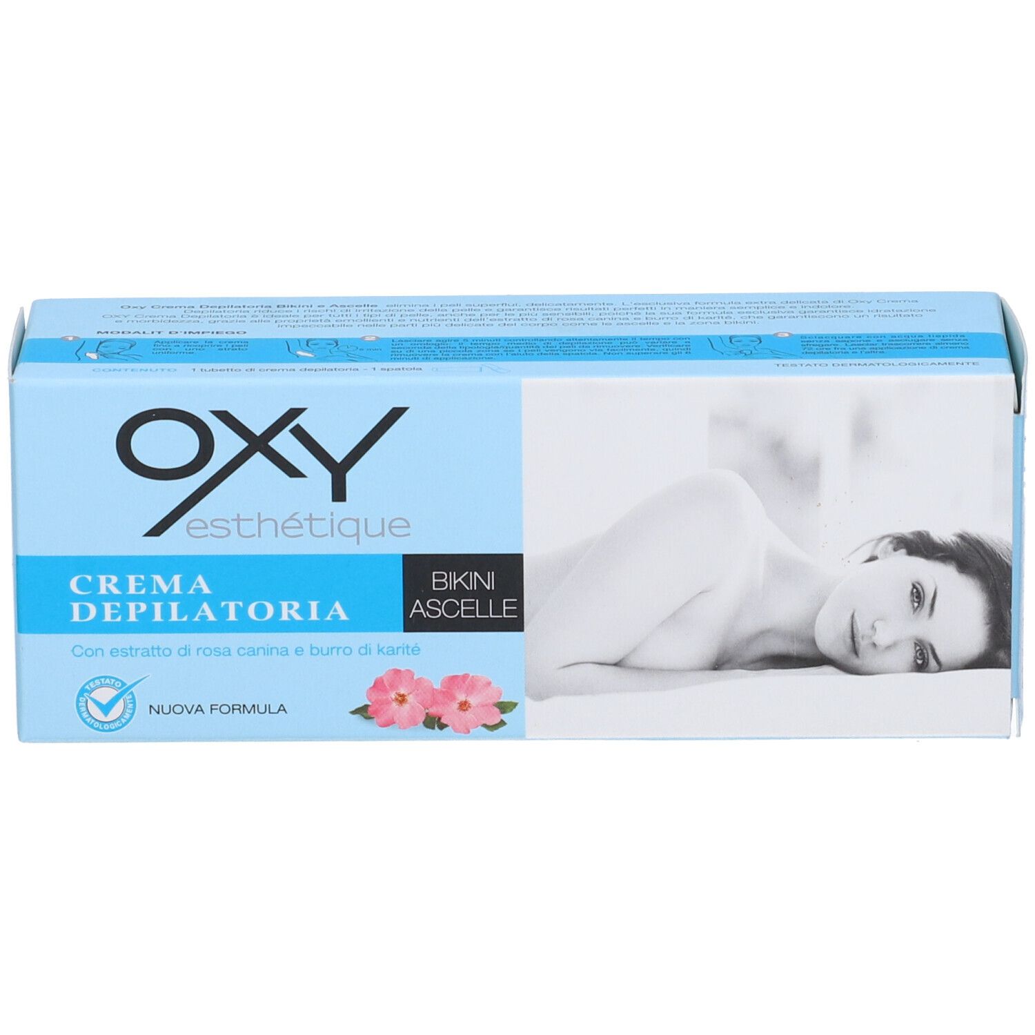 Confezione Oxy esthetique Crema Depilatoria. Blu chiaro, nome prodotto, immagine e testo. Fiori rosa.