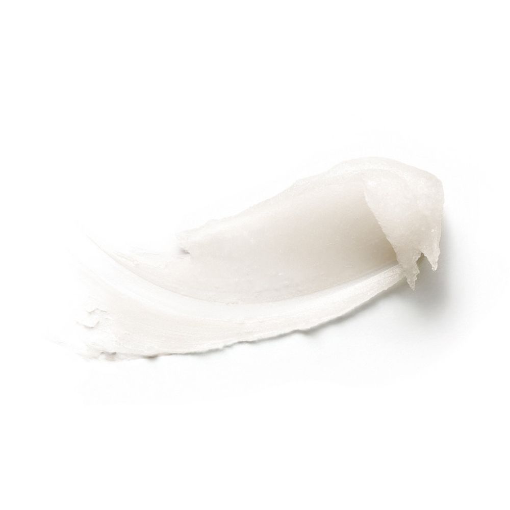 Striscio di balsamo labbra bianco su sfondo bianco.
