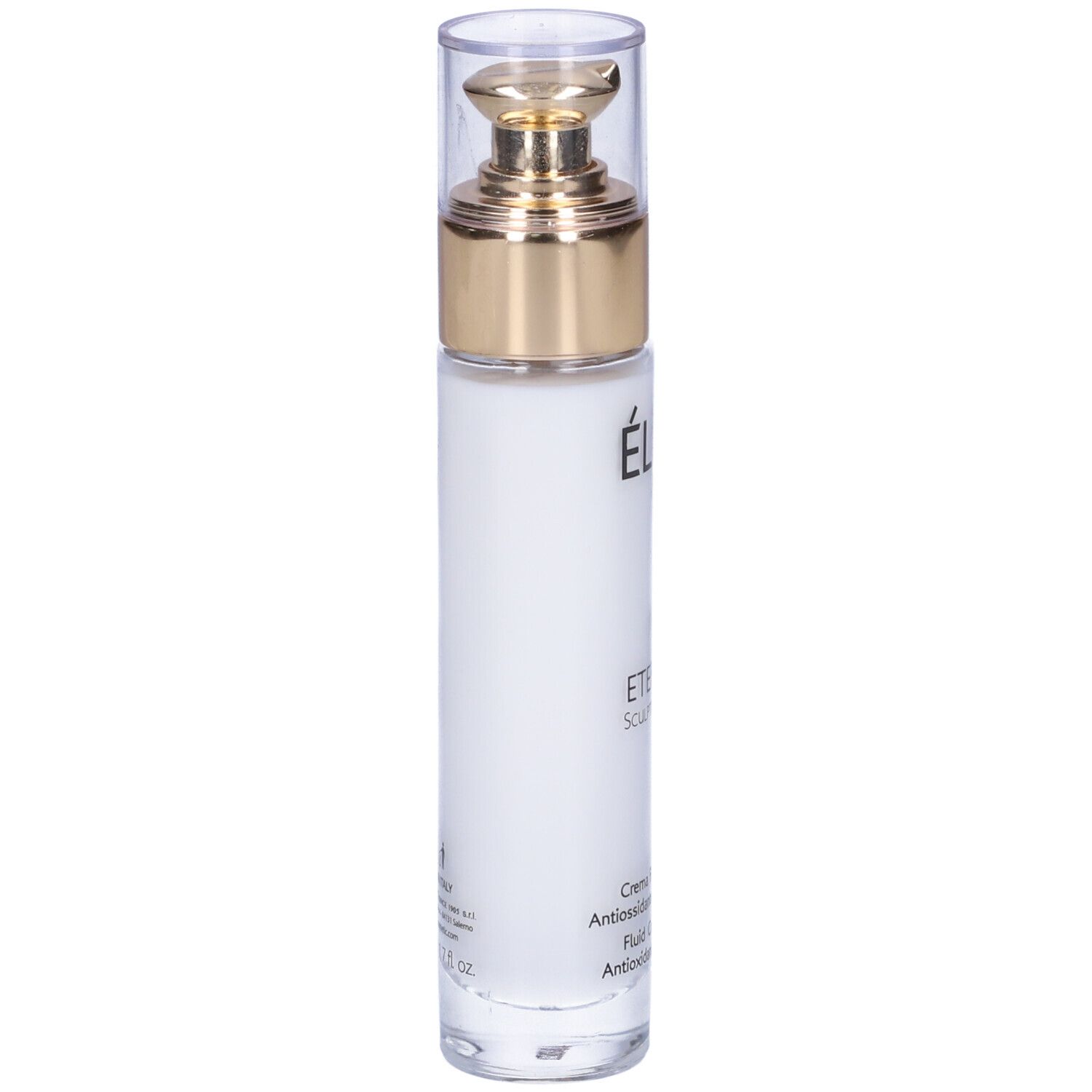 Flacone bianco con tappo dorato. Scritte: Élève, Eternity, Sculpting Youth, Crema Fluida SPF 30.