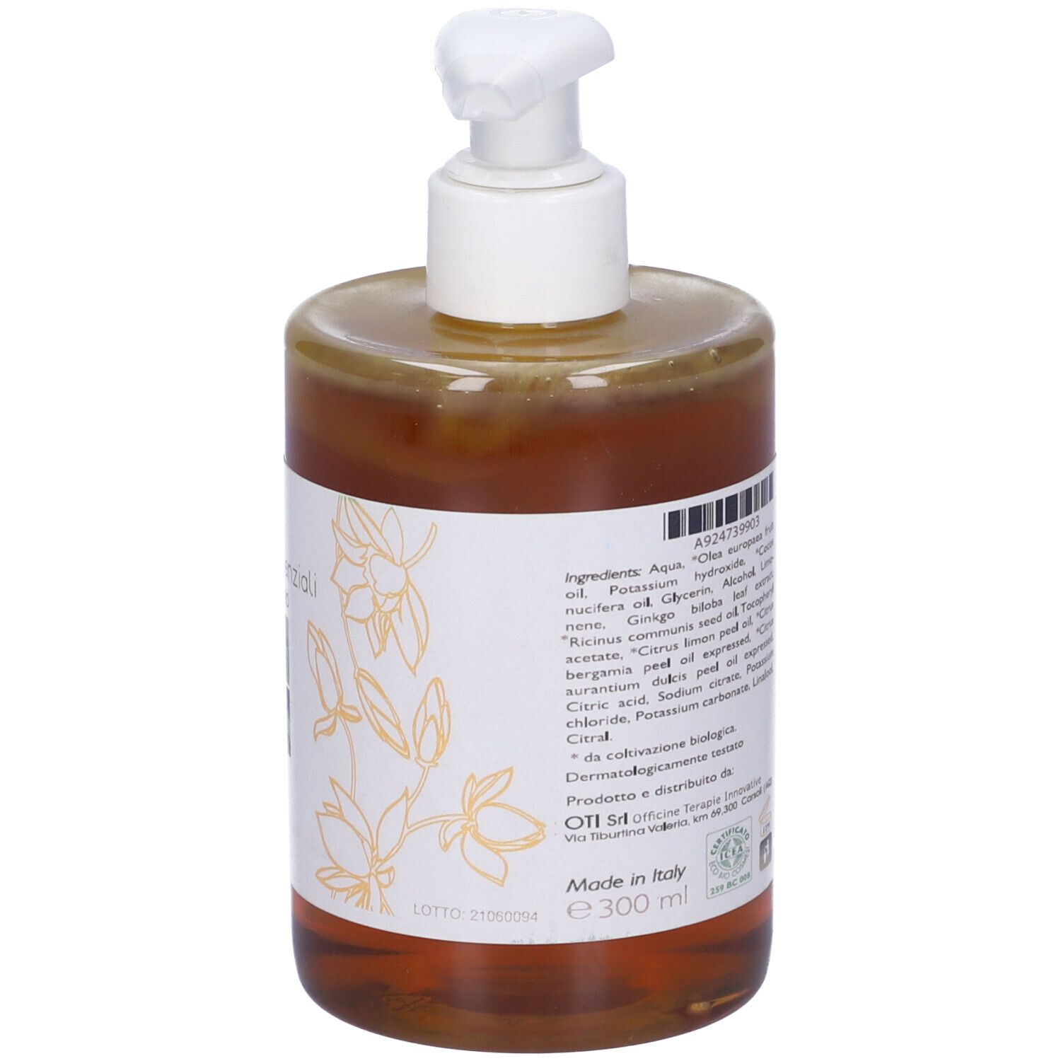 Flacone trasparente con liquido marrone e dosatore bianco. Etichetta con ingredienti e testo.
