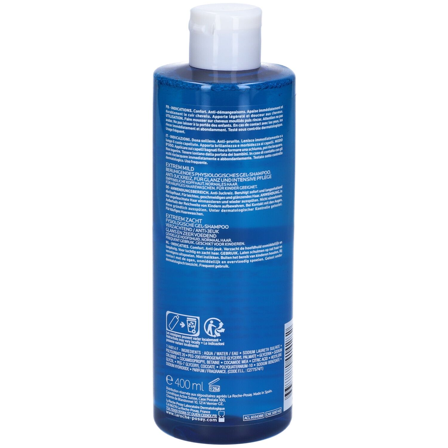 Retro di un flacone blu con tappo bianco. Testo: Kerium Doux Extreme, Shampooing-Gel Physiologique. Ingredienti e informazioni.