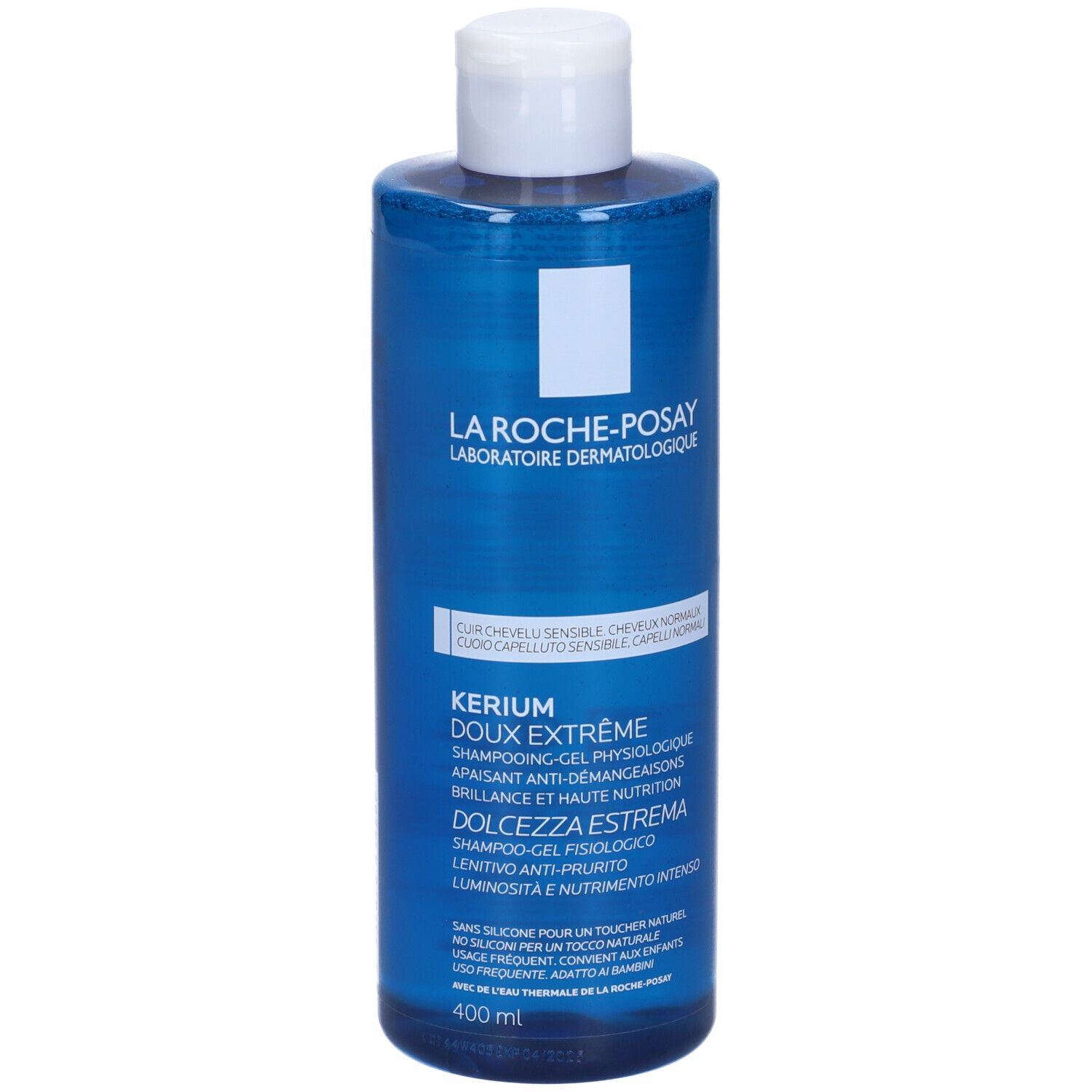 Flacone blu con tappo bianco. Scritta: Kerium Doux Extreme, Shampooing-Gel Physiologique. Per capelli sensibili.