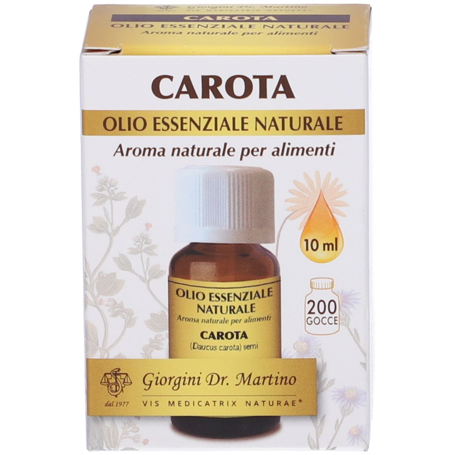 Scatola e flacone di vetro marrone. Scritta: Carota Olio Essenziale Naturale. Con indicazione del volume 10 ml.