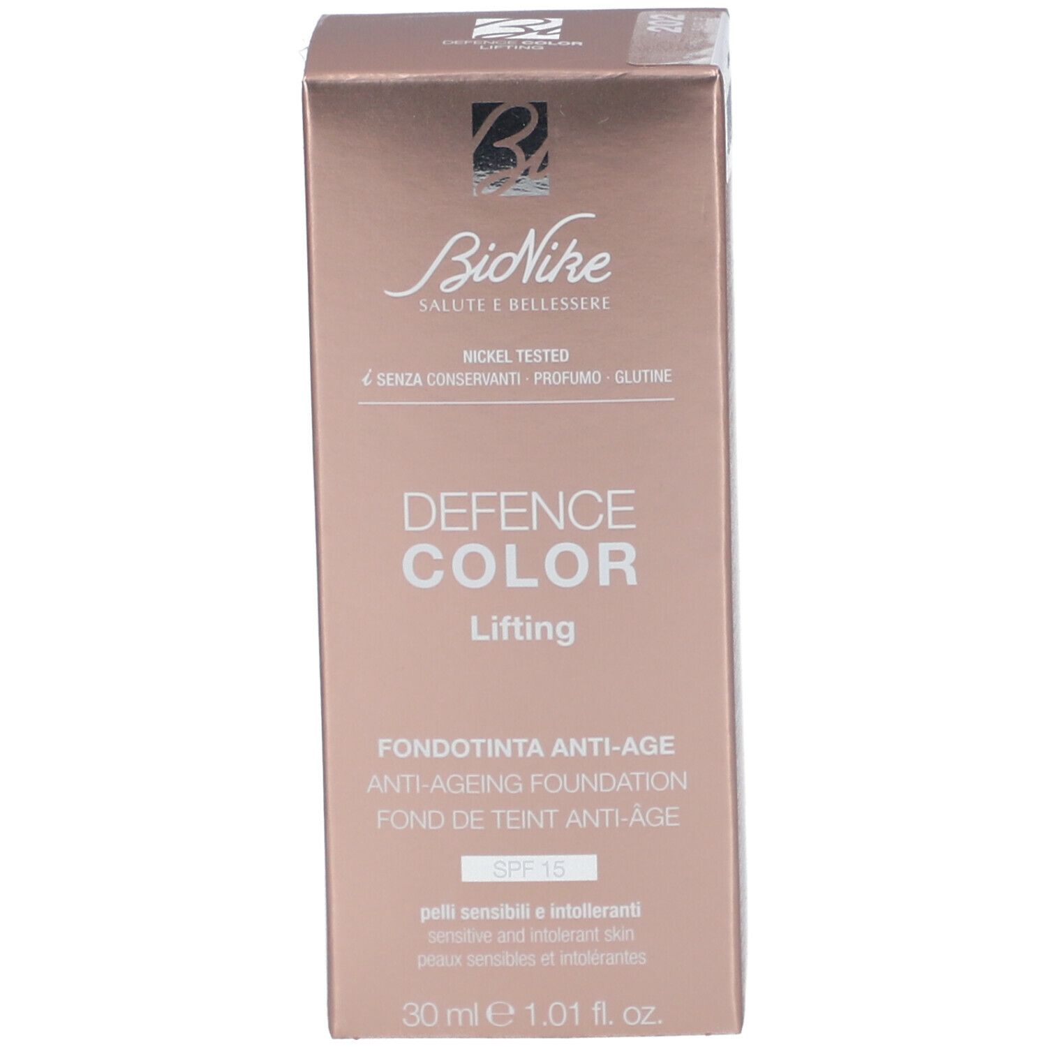 Confezione del fondotinta lifting BioNike Defence Color. Scatola rettangolare. Scritte: Defence Color Lifting, Anti-Ageing Foundation, SPF 15, 30 ml.