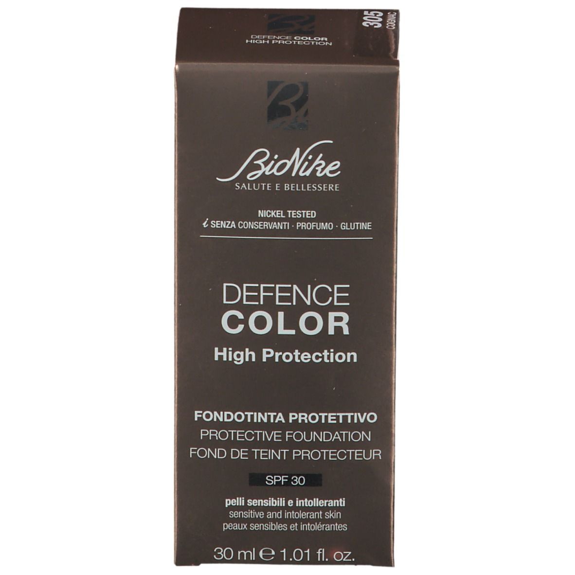 Verpackung. Aufschrift: DEFENCE COLOR, High Protection, Protective Foundation, SPF 30. Marke: BioNike. Farbton 305 Cognac.