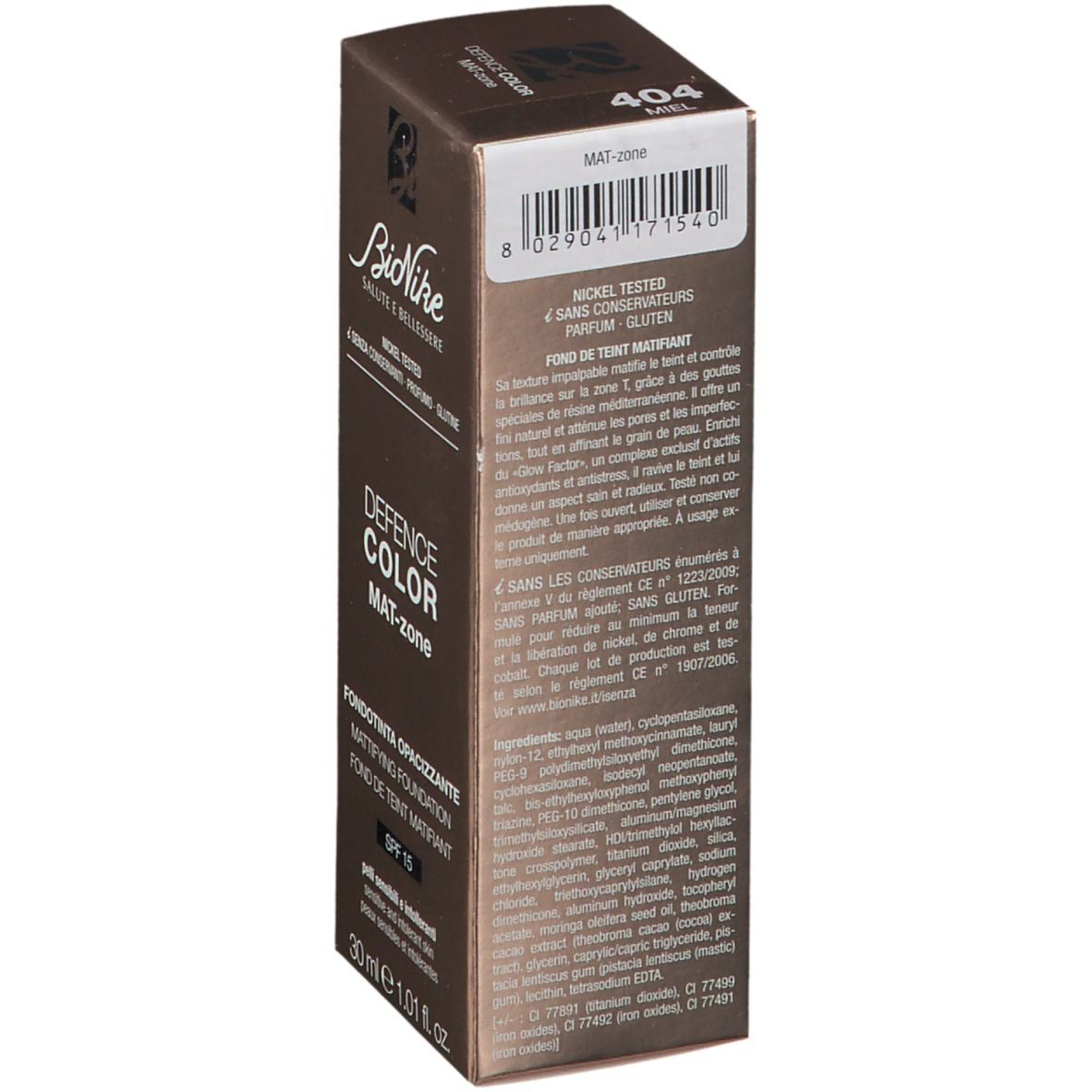 Confezione marrone. Scritta: Defence Color Mat-zone, SPF 15. Marchio: BioNike. Retro con testo e codice a barre.