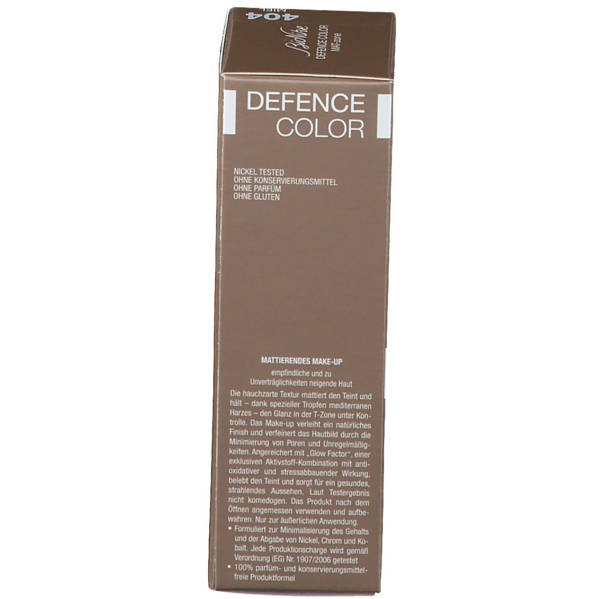 Confezione marrone. Scritta: Defence Color Mat-zone, SPF 15. Marchio: BioNike. Lato con testo.