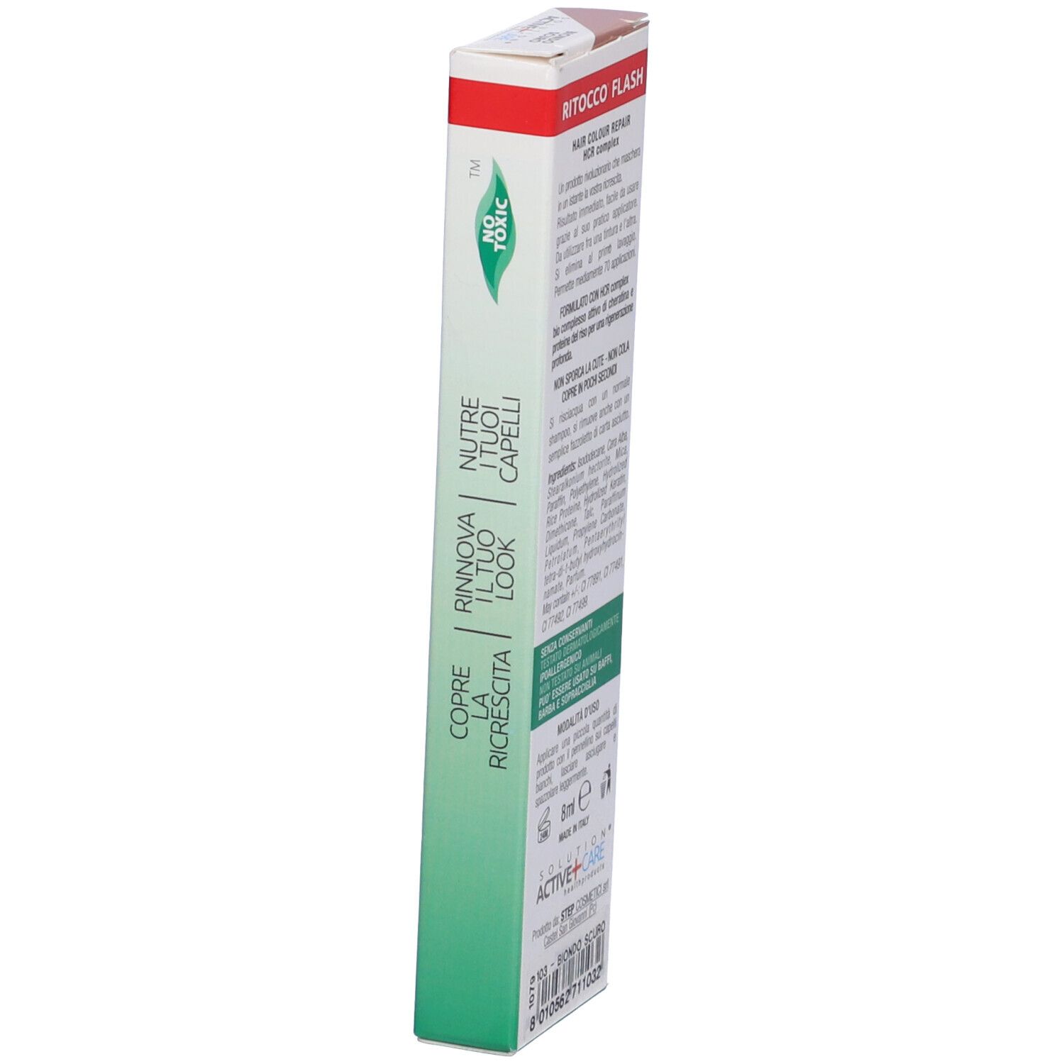 Scatola con testo. Testo: RITOCCO FLASH, COPRE LA RICRESCITA, RINNOVA IL TUO LOOK, NUTRE I CAPELLI.