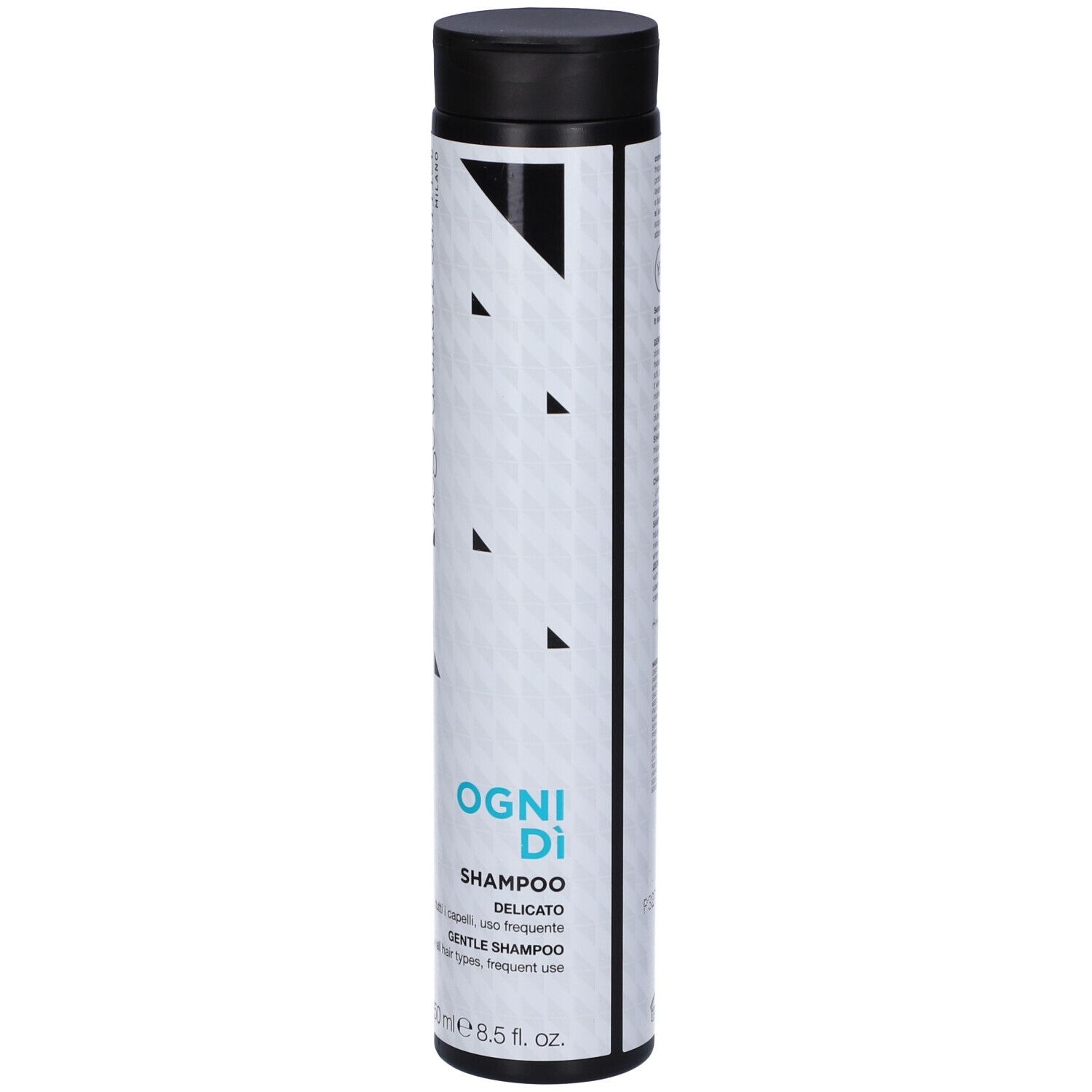 Flacone cilindrico con tappo nero. Scritta: OGI Di, Shampoo Delicato, 250 ml. Marchio: Diego dalla Palma Milano.