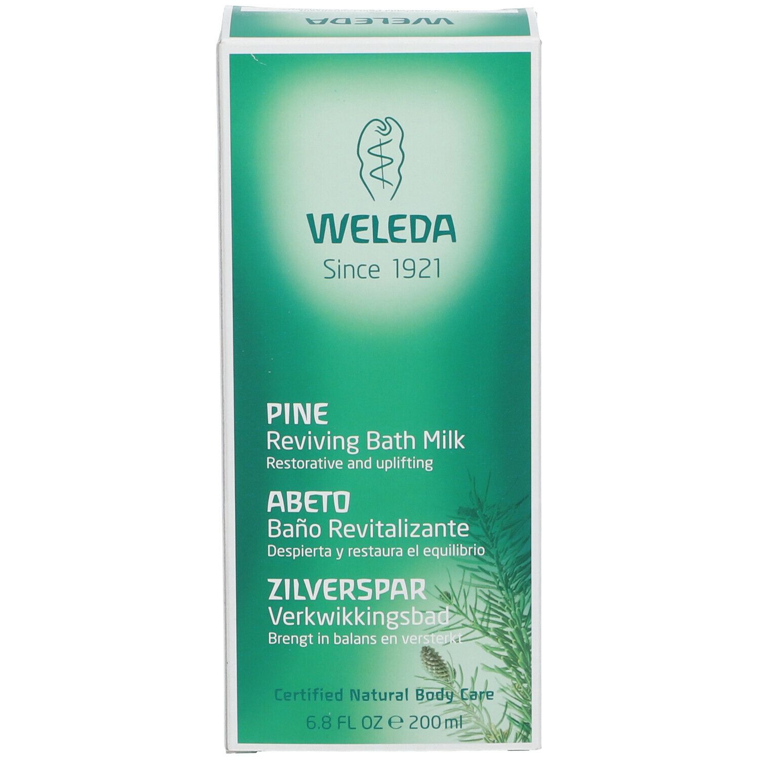 Confezione verde con nome e logo del prodotto. Testo in tedesco, inglese, spagnolo e olandese. "Weleda" e "Pine Reviving Bath Milk" visibili.