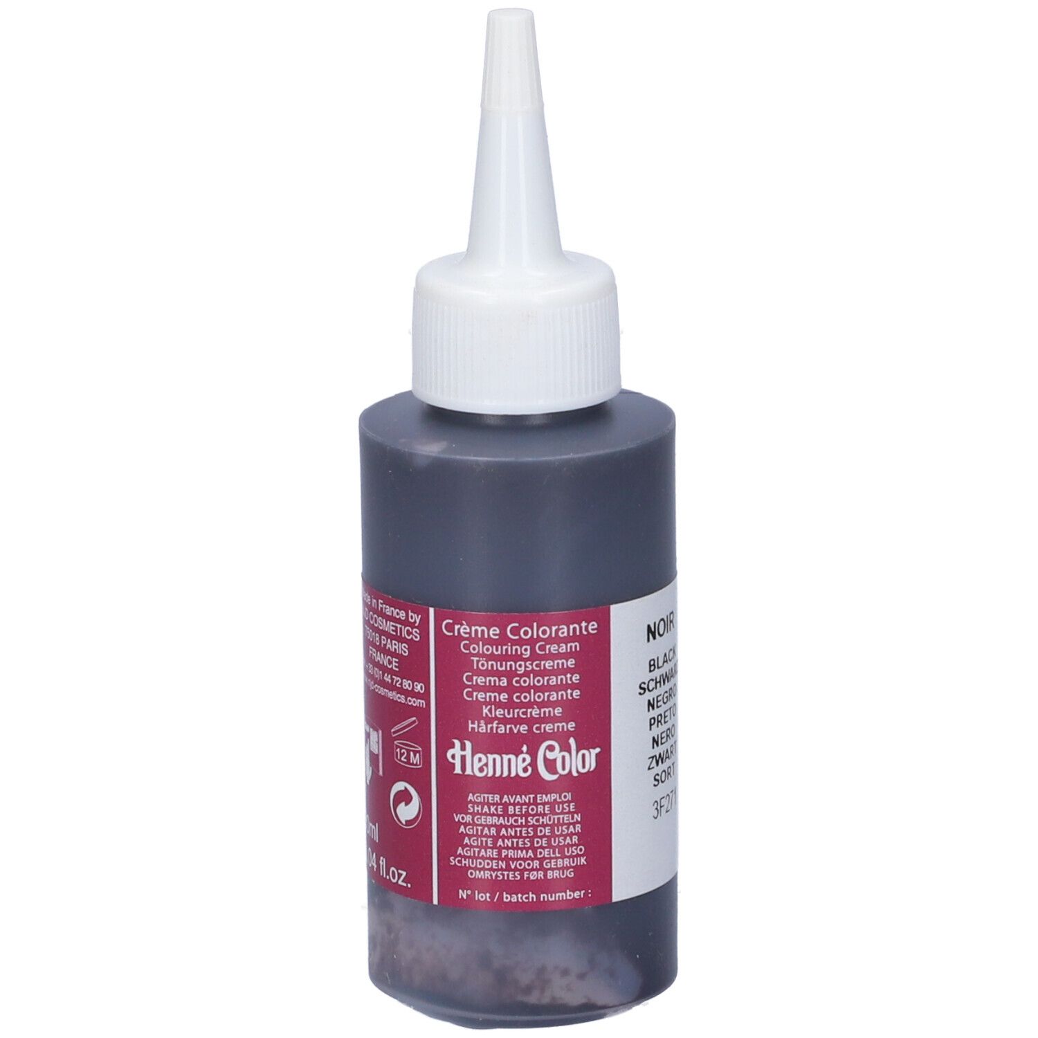 Flacone di crema nera. Scritta: Crème Colorante, Henne Color. Colore nero.