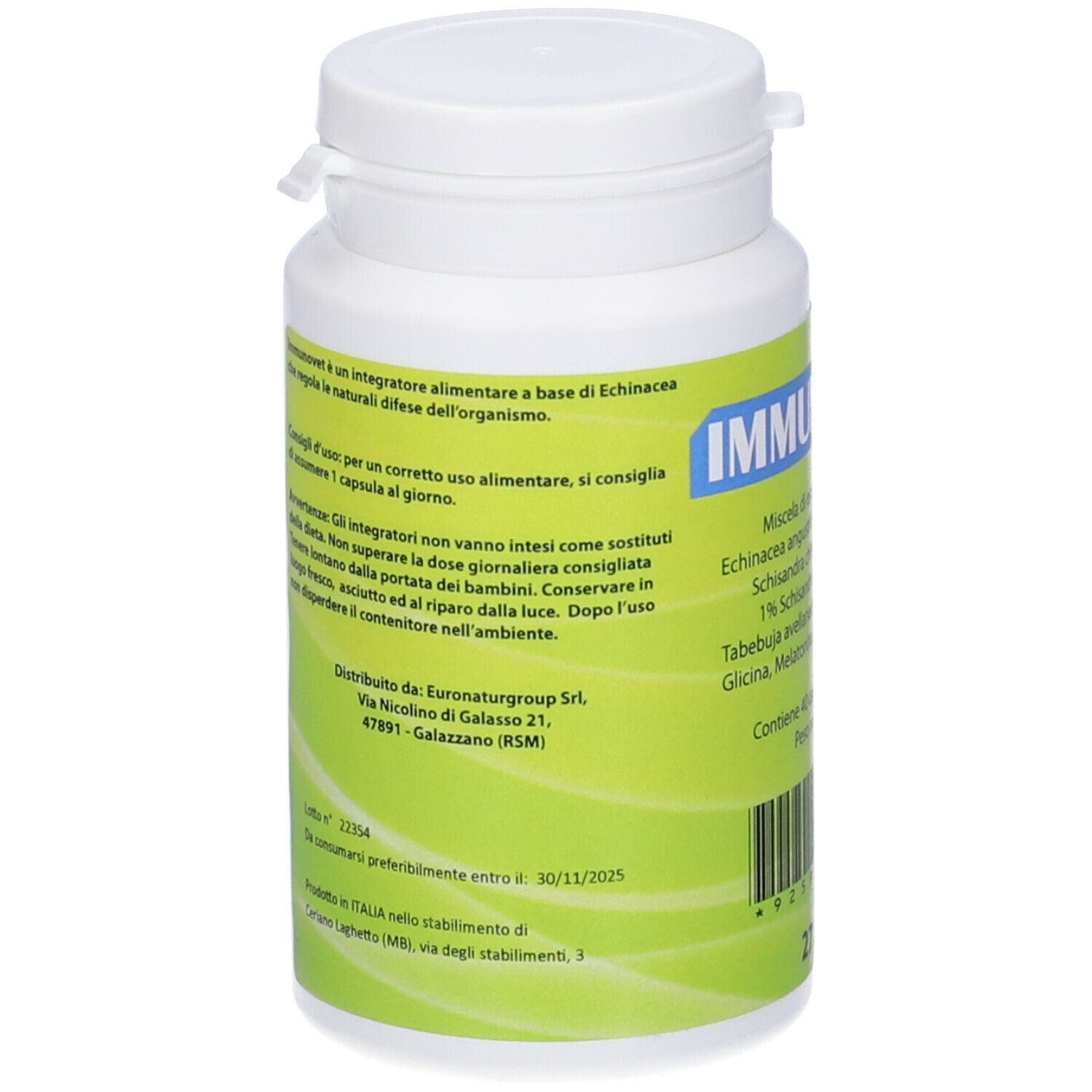 Flacone bianco con etichetta verde. Testo sugli ingredienti e il produttore. Coperchio con chiusura.