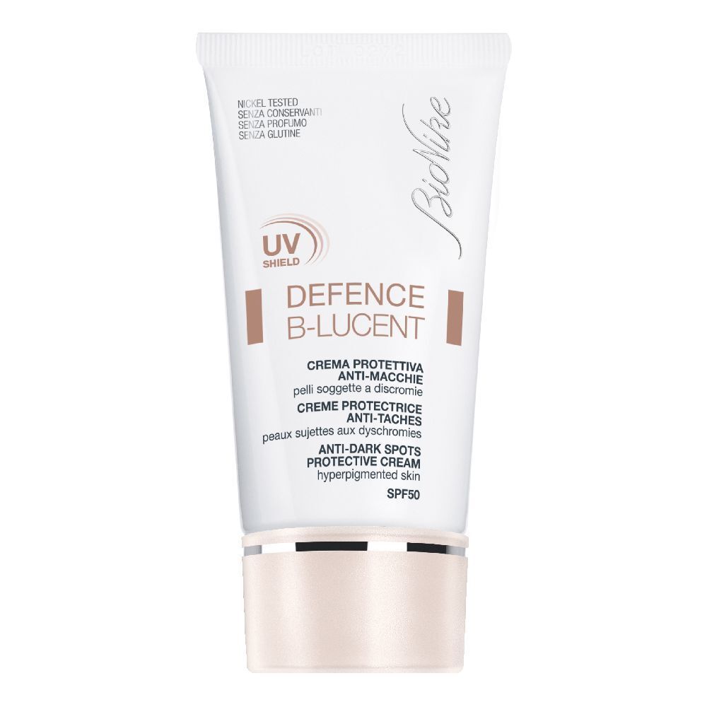 Tube de crème blanche. Inscription : DEFENCE B-LUCENT, crème protectrice anti-taches SPF 50. Marque : BioNike.