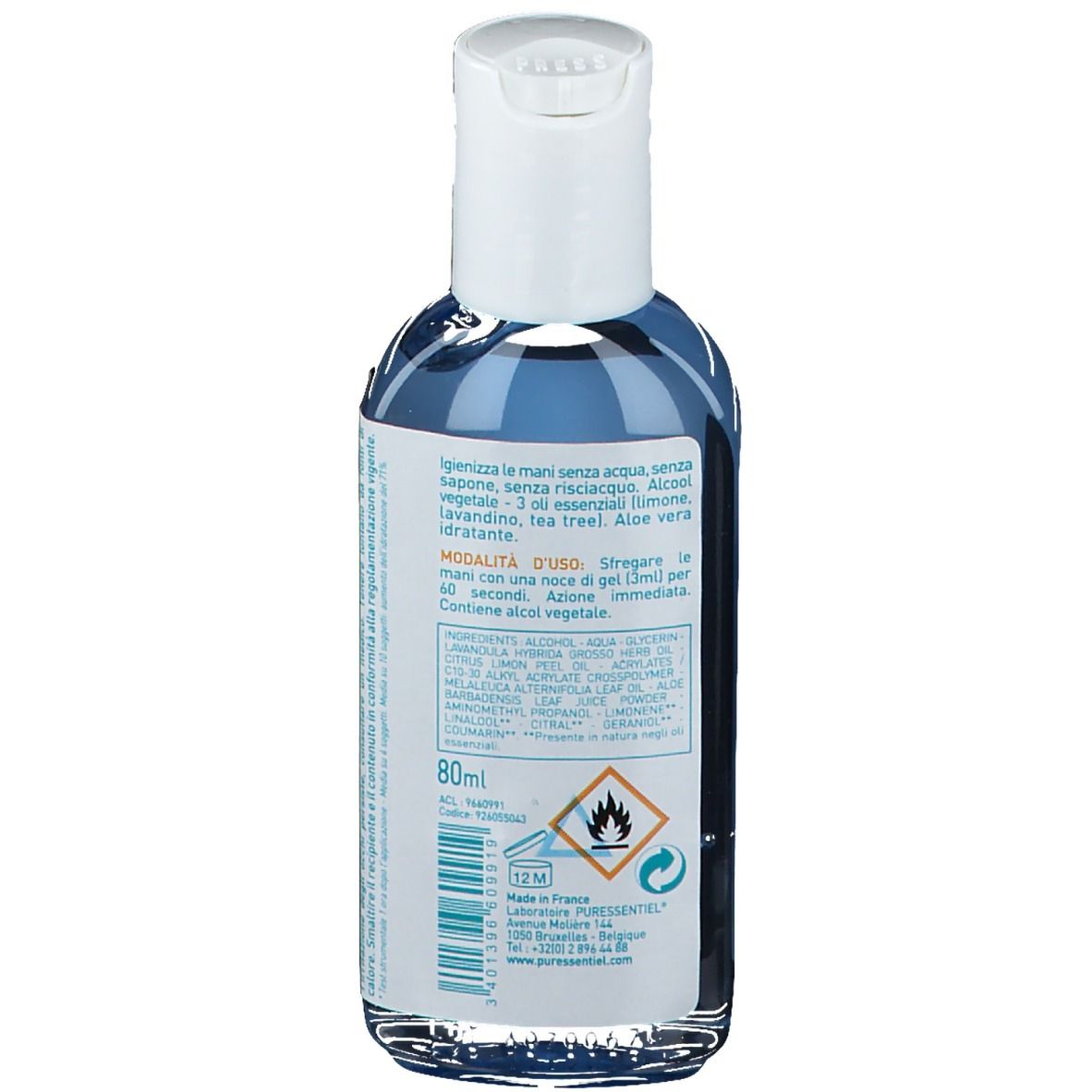 Dos d'un flacon transparent avec liquide bleu. Étiquette blanche avec texte et symboles. Contient du texte en plusieurs langues.