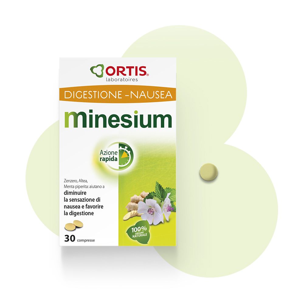 Confezione Minesium. Scatola bianca con design verde e giallo. Testo: Digestione-Nausea, 30 compresse, 100% naturale.
