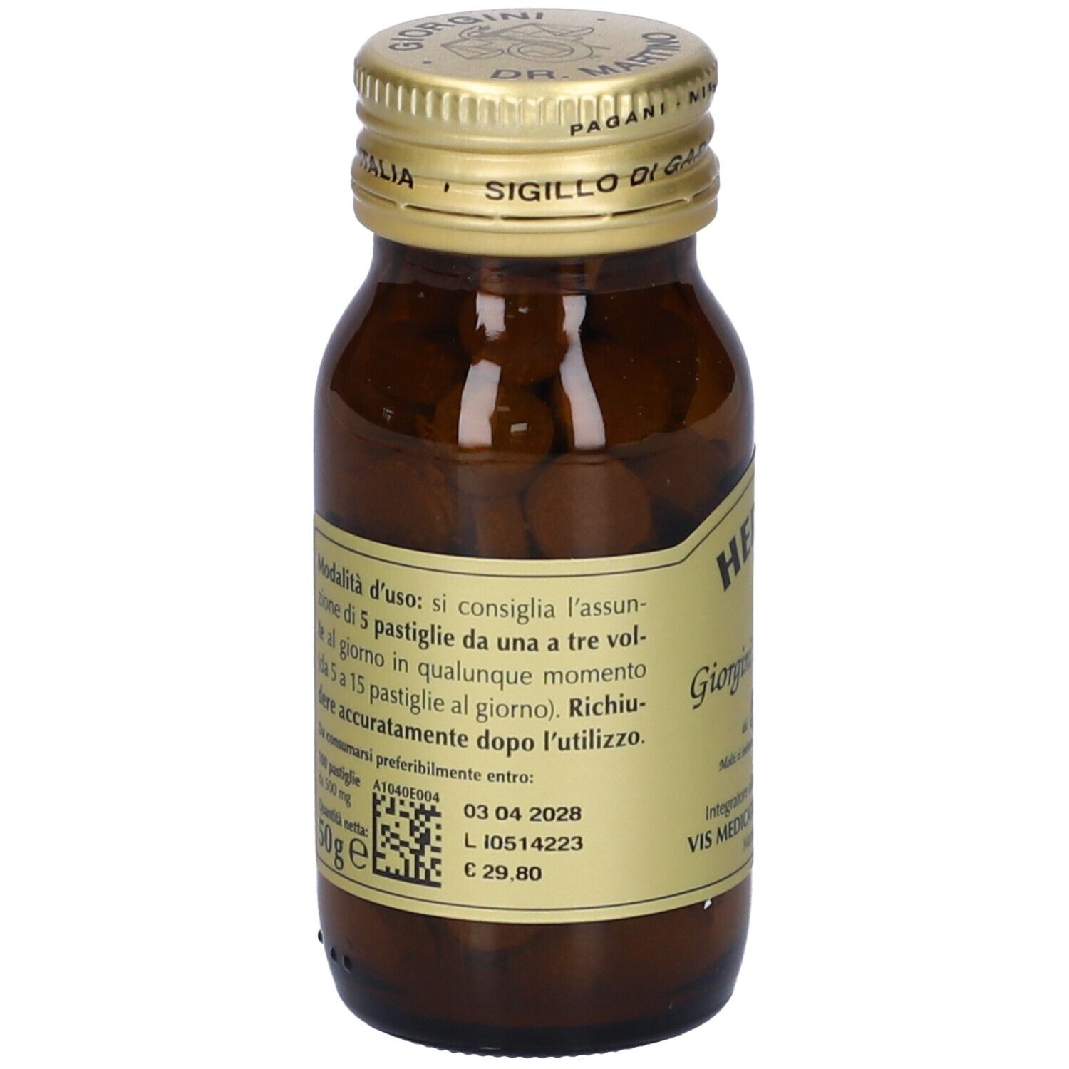 Bottiglia di vetro marrone con tappo dorato ed etichetta. Etichetta con informazioni sul prodotto, ingredienti e dosaggio. Compresse visibili.