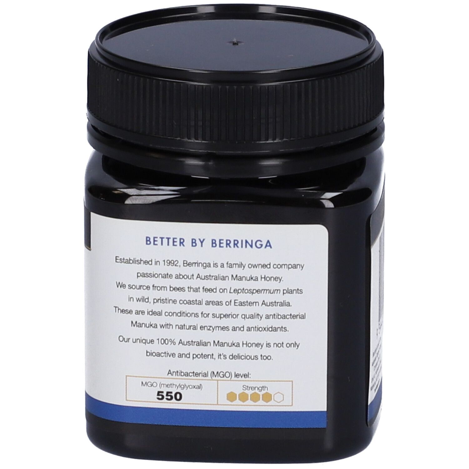 Barattolo scuro con coperchio nero. Retro con testo. Contiene informazioni sul marchio e il contenuto di MGO.