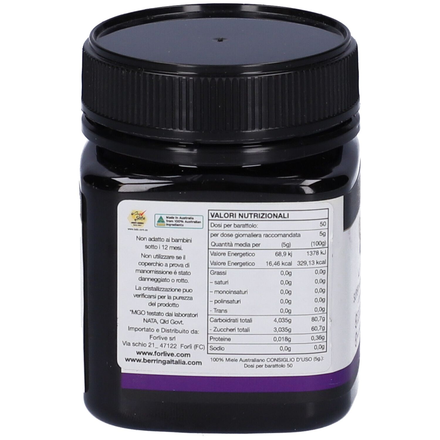 Retro di un vasetto di vetro marrone con coperchio nero. Etichetta con informazioni nutrizionali e testo in italiano.