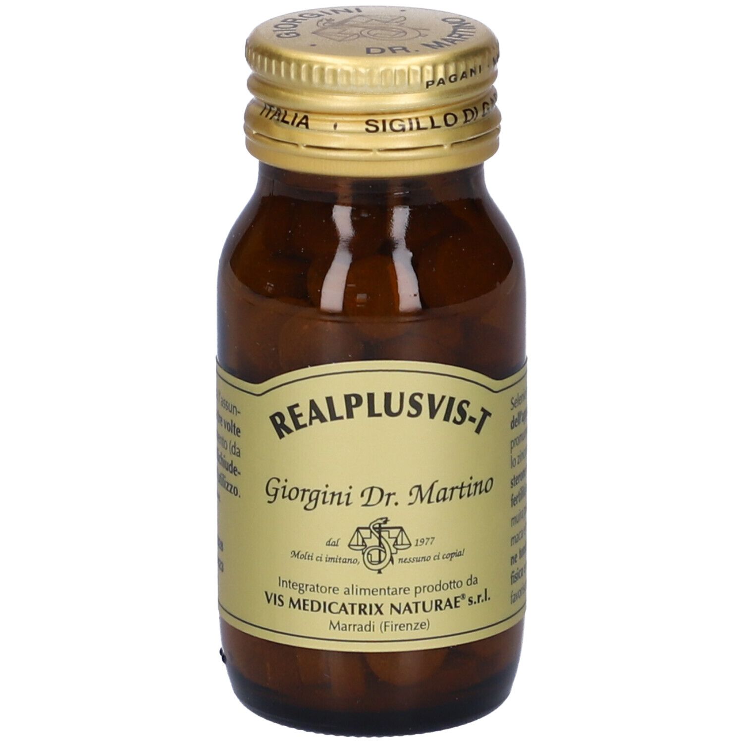 Flacone di vetro marrone con tappo dorato. Etichetta con nome del prodotto e informazioni del produttore. Compresse visibili.