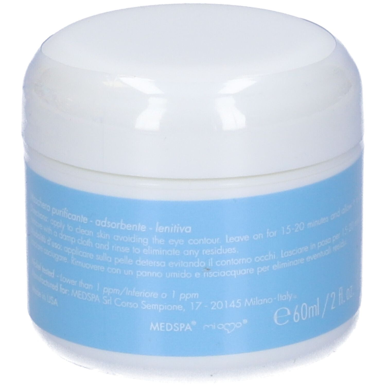 Vasetto bianco con etichetta blu. Scritta: MIAMO, CLEANSING-PURIFYING MASQUE. Testo e informazioni su uso e ingredienti.