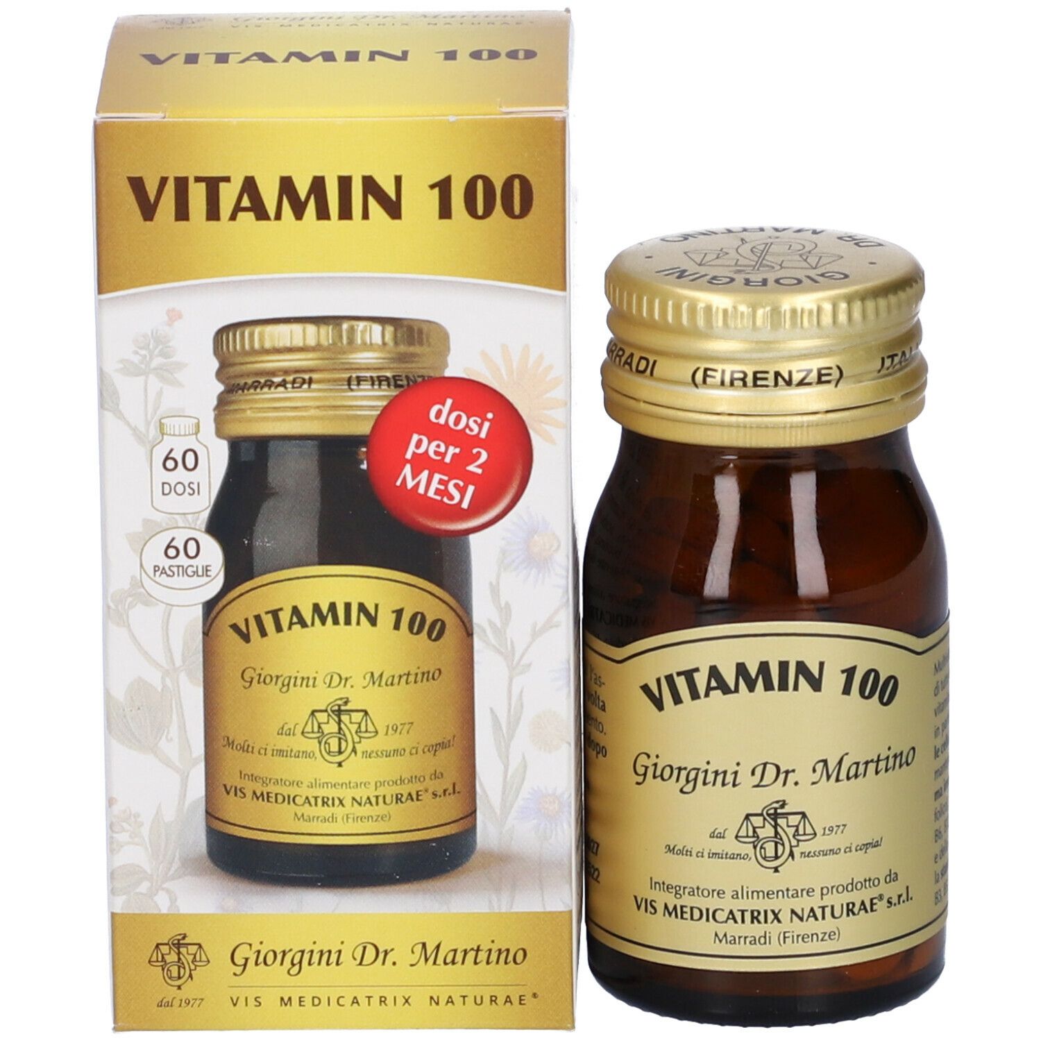 Flacone di vetro marrone con tappo dorato. Etichetta "Vitamin 100" e "Giorgini Dr. Martino".