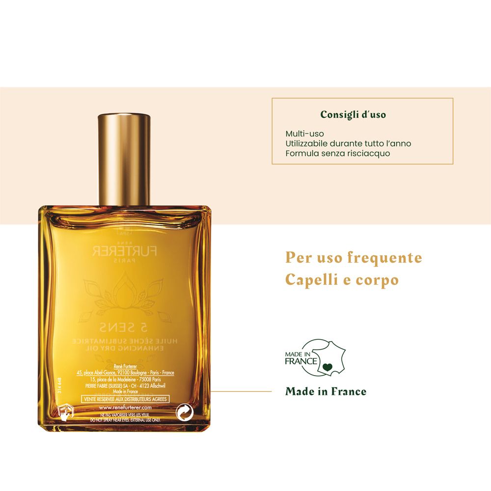 Flacone in vetro con tappo dorato. Testo: 5 SENS, olio secco. Testo: Per uso frequente. Made in France.