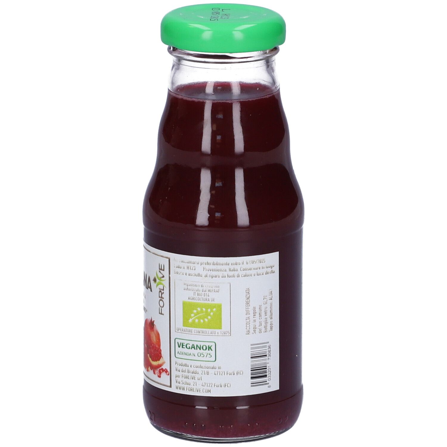 Retro di una bottiglia di succo di melograno. Tappo verde, etichetta bianca con informazioni e certificazione bio. Sigillo vegano.