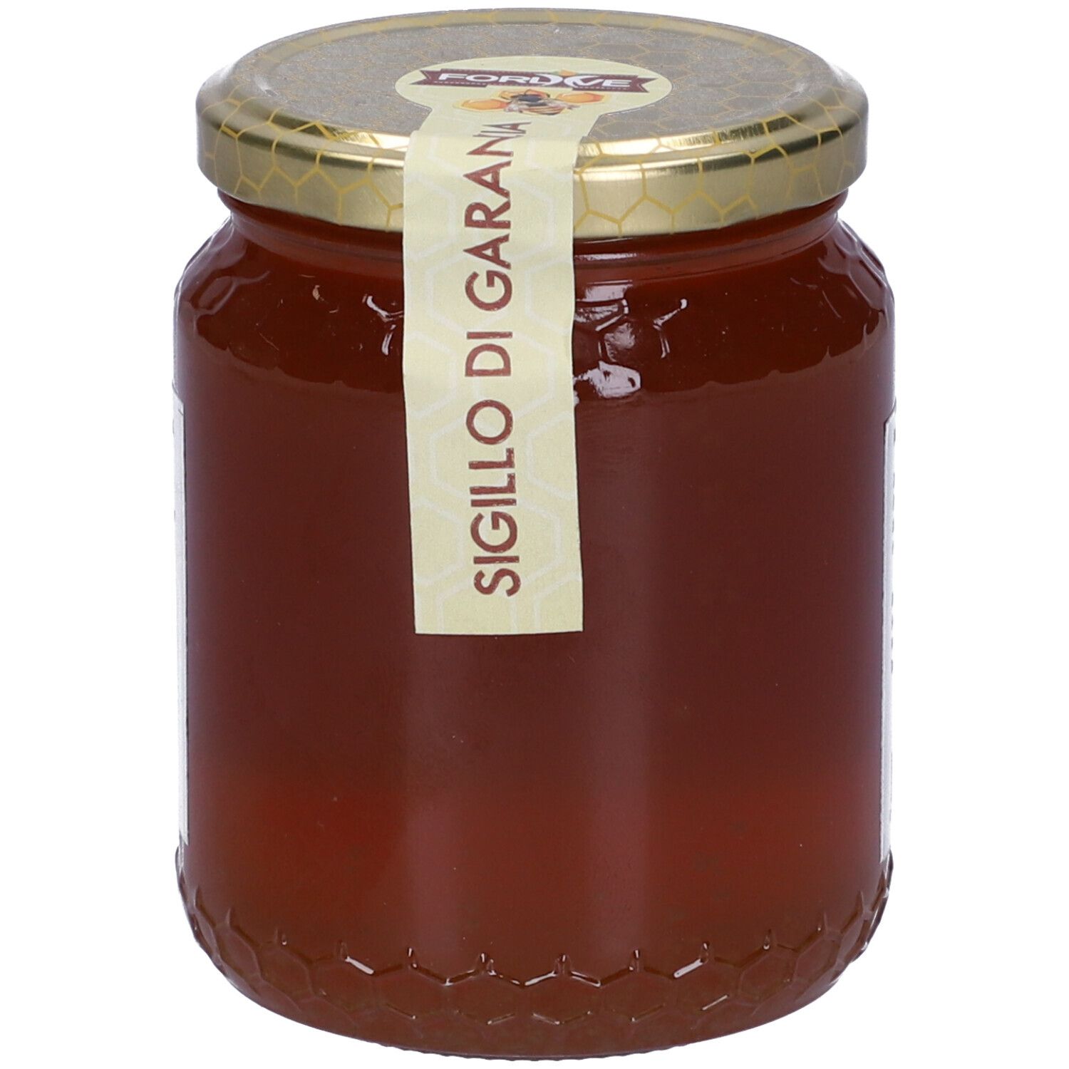 Vasetto di miele con coperchio dorato ed etichetta. Scritta: Sigillo di Garanzia. Miele visibile.