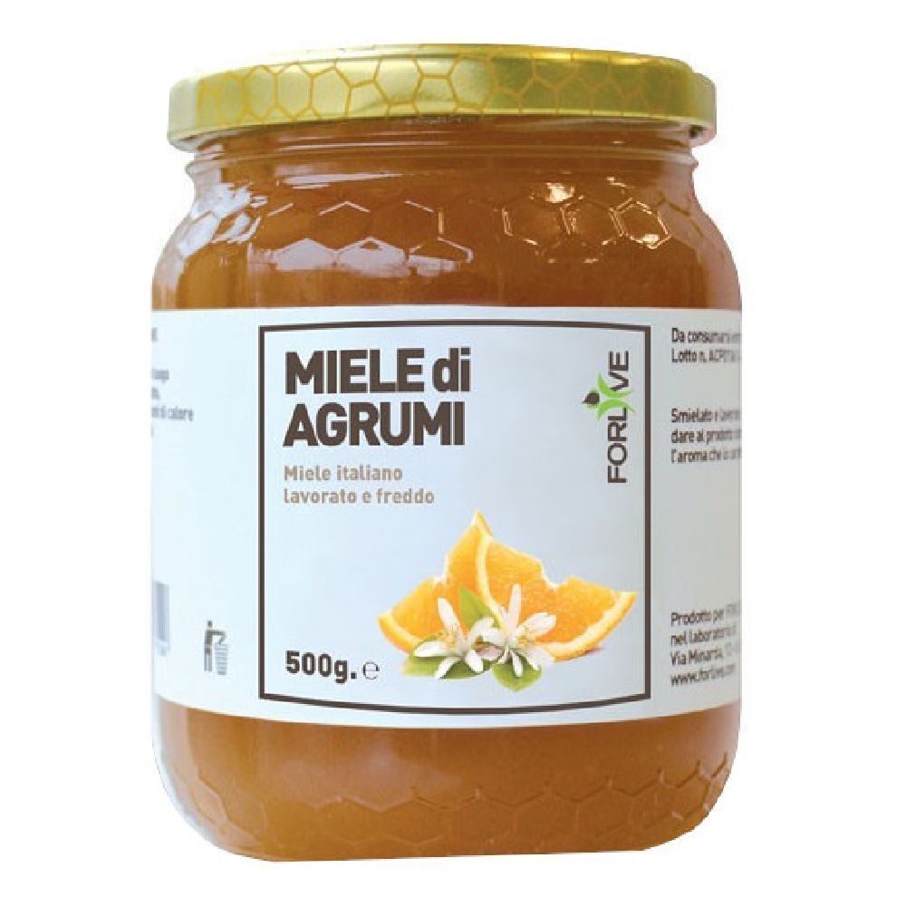 Vasetto di miele. Etichetta con "Miele di Agrumi" e illustrazione di arance. Coperchio dorato.