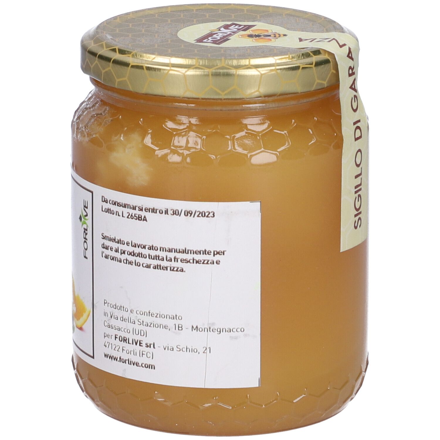 Vasetto di miele. Etichetta con "Sigillo di Garanzia". Coperchio dorato.