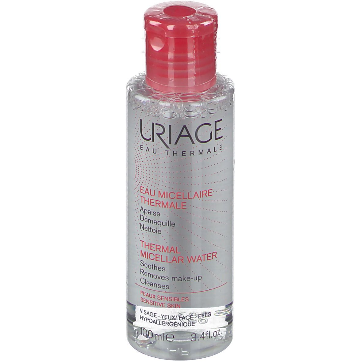 Uriage Acqua Micellare Termale. Flacone trasparente, tappo rosso. Scritte bianche e rosse. Per pelli sensibili.
