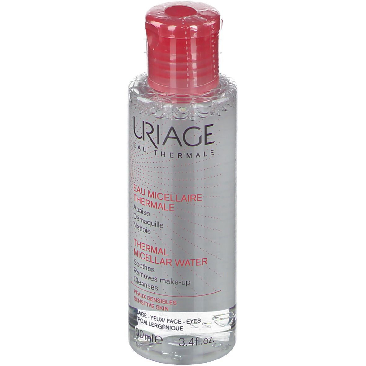Uriage Acqua Micellare Termale. Flacone trasparente, tappo rosso. Scritte bianche e rosse. Per pelli sensibili.