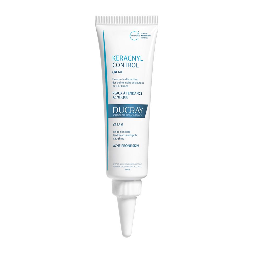 Tube de crème Ducray Keracnyl Control. Blanc, bleu. Avec embout. Texte: Keracnyl Control, Crème, Ducray, Peaux à tendance acnéique.