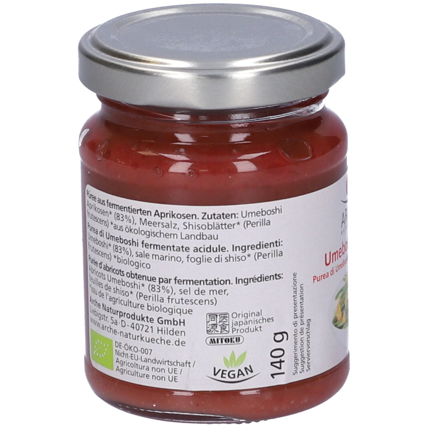 Retro del vasetto di purea di Umeboshi. Lista ingredienti, sigillo bio, logo vegano e 140g. Coperchio argentato.