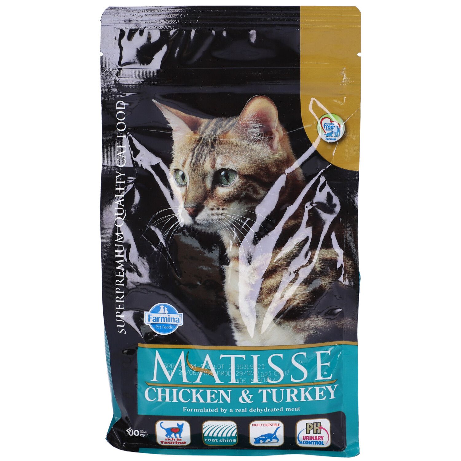 Confezione di cibo per gatti. Scritta: Matisse Chicken & Turkey. Immagine di un gatto. Logo Farmina. Colori blu, nero e oro.