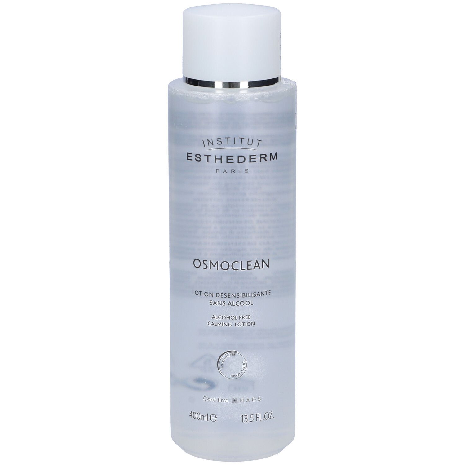 Flacone trasparente con tappo bianco. Scritte: Institut Esthederm, Osmoclean, Lotion Desensibilisante, sans alcool. 400ml, 13.5 FL OZ.