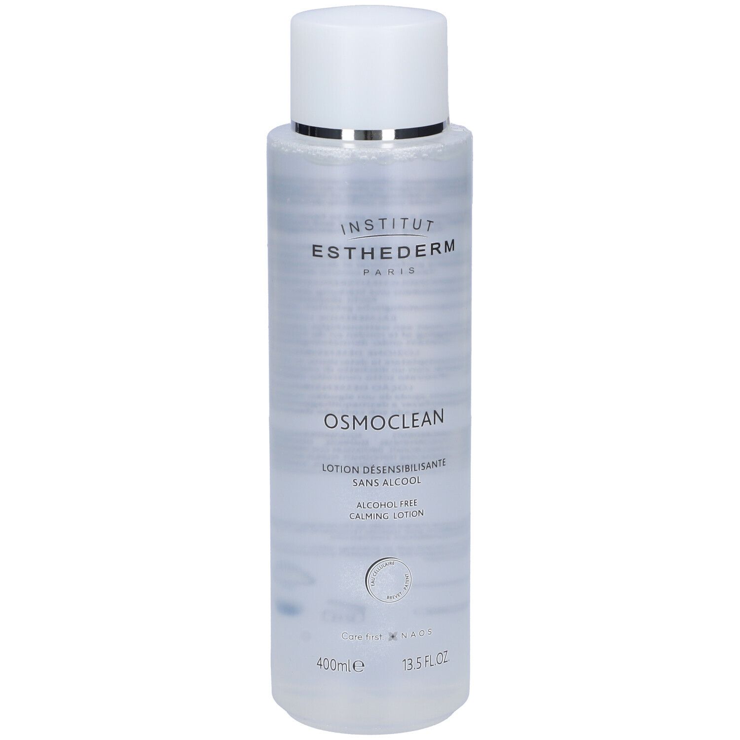 Flacone trasparente con tappo bianco. Scritte: Institut Esthederm, Osmoclean, Lotion Desensibilisante, sans alcool. 400ml, 13.5 FL OZ.