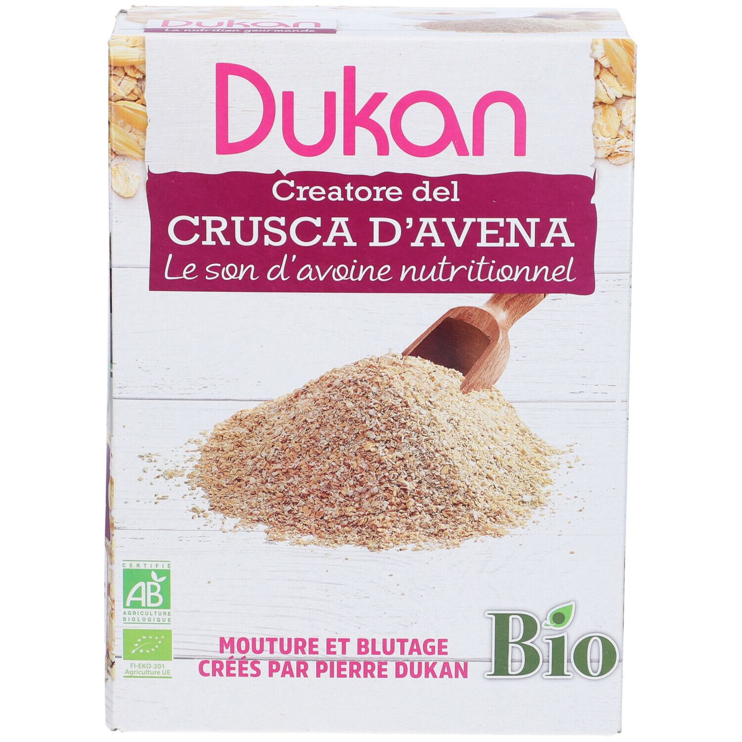 Confezione di Dukan Crusca d'avena bio. Fronte con nome prodotto, testo ed etichetta bio. Crusca d'avena con paletta in legno.