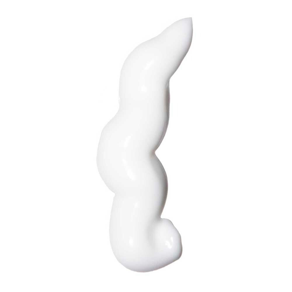 Strang weißer Creme. Die Creme hat eine wellenförmige Form.