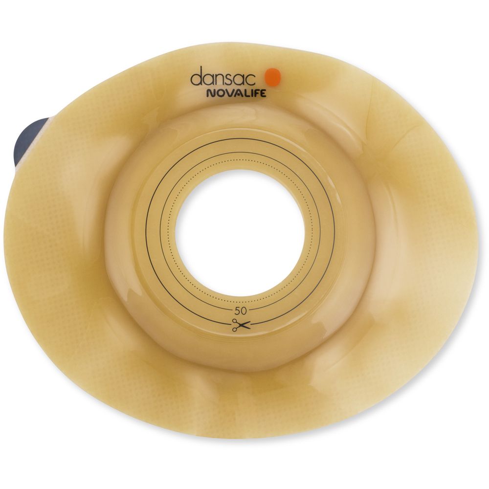 Dispositivo medico. Placca base beige rotonda con apertura centrale e marcature. Marchio: Dansac Novalife.