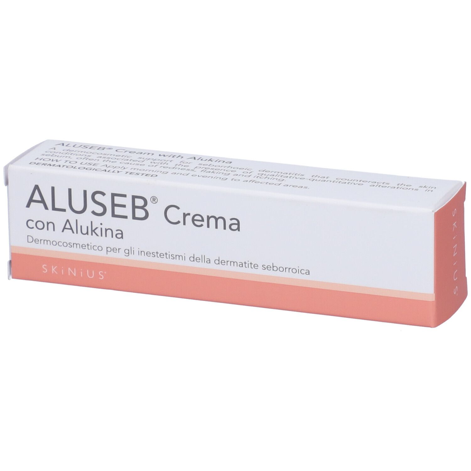 Boîte. Inscription: ALUSEB® Crema con Alukina. Blanc avec accents roses. Dermocosmétique.