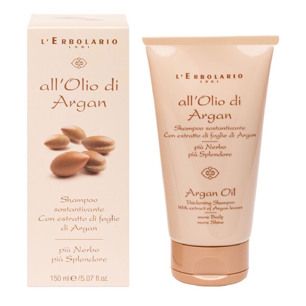 Tubo e scatola beige. Scritta: L'Erbolario, all'Olio di Argan, Shampoo. Illustrazione di semi di argan.