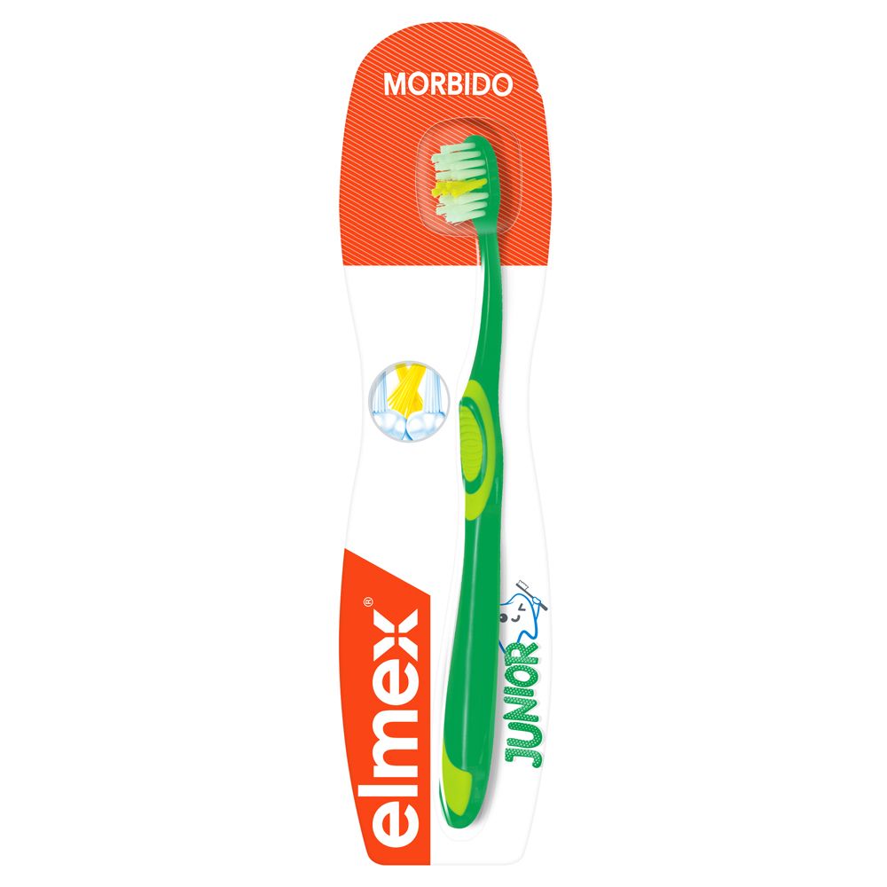 Grüne elmex® Junior Zahnbürste in Verpackung. Borsten gelb und weiß. Griff mit gelben Akzenten. Aufschrift 'MORBIDO'.