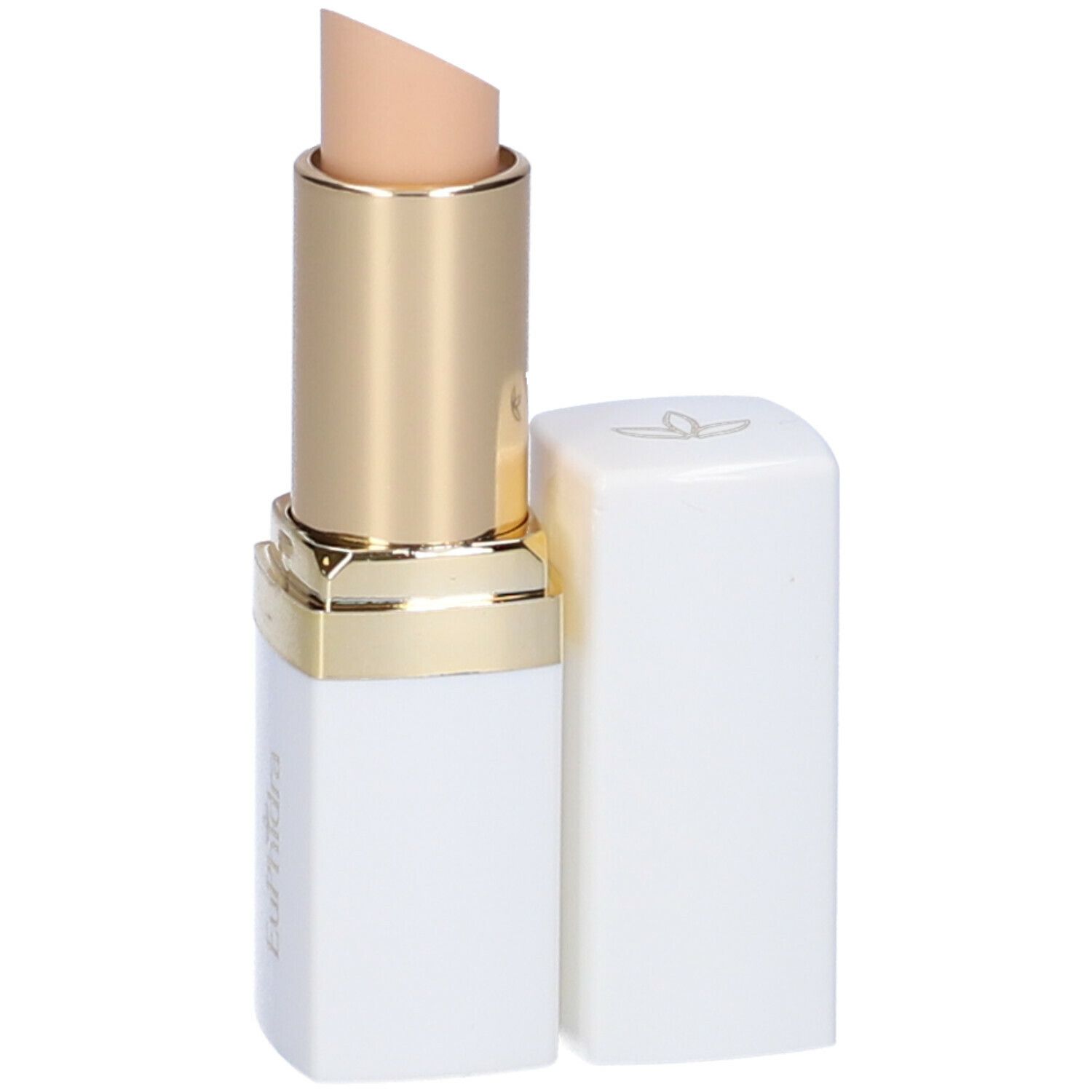 Stick correttore bianco e oro con punta beige. Tappo accanto.