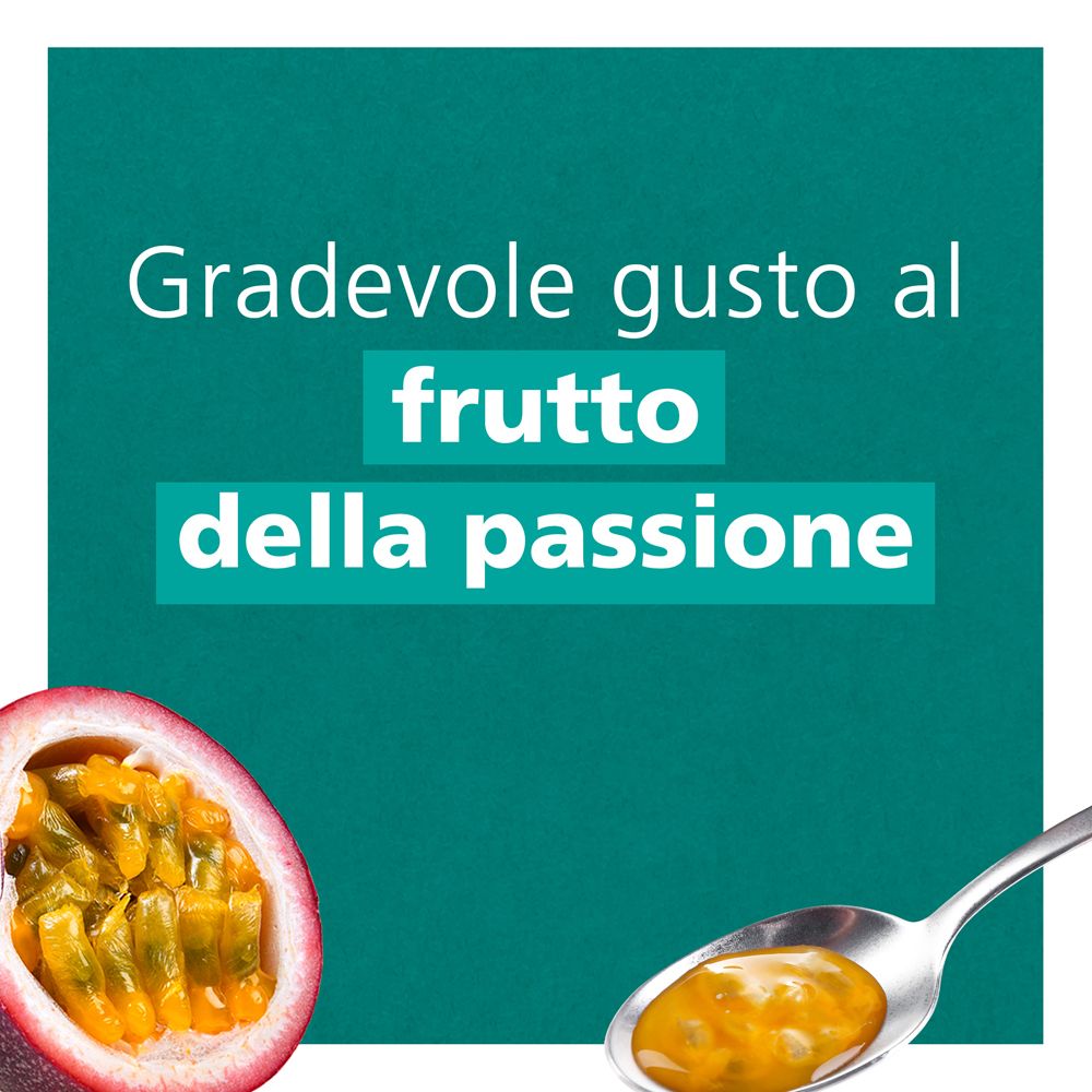 Metà frutto della passione con cucchiaio. Testo: Gusto gradevole al frutto della passione.