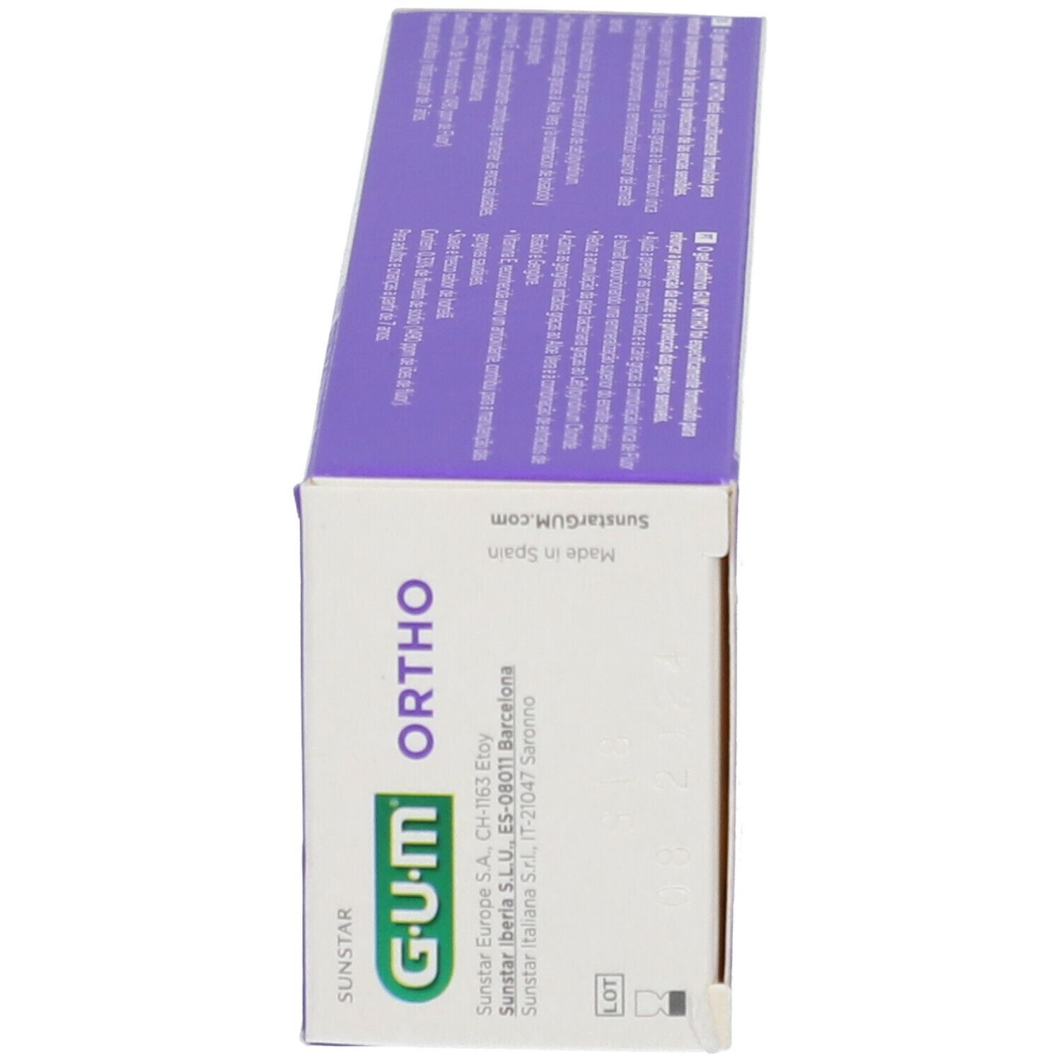 Scatola di dentifricio G.U.M. Ortho. Lato. Testo: Indirizzo produttore, Prodotto in Spagna.