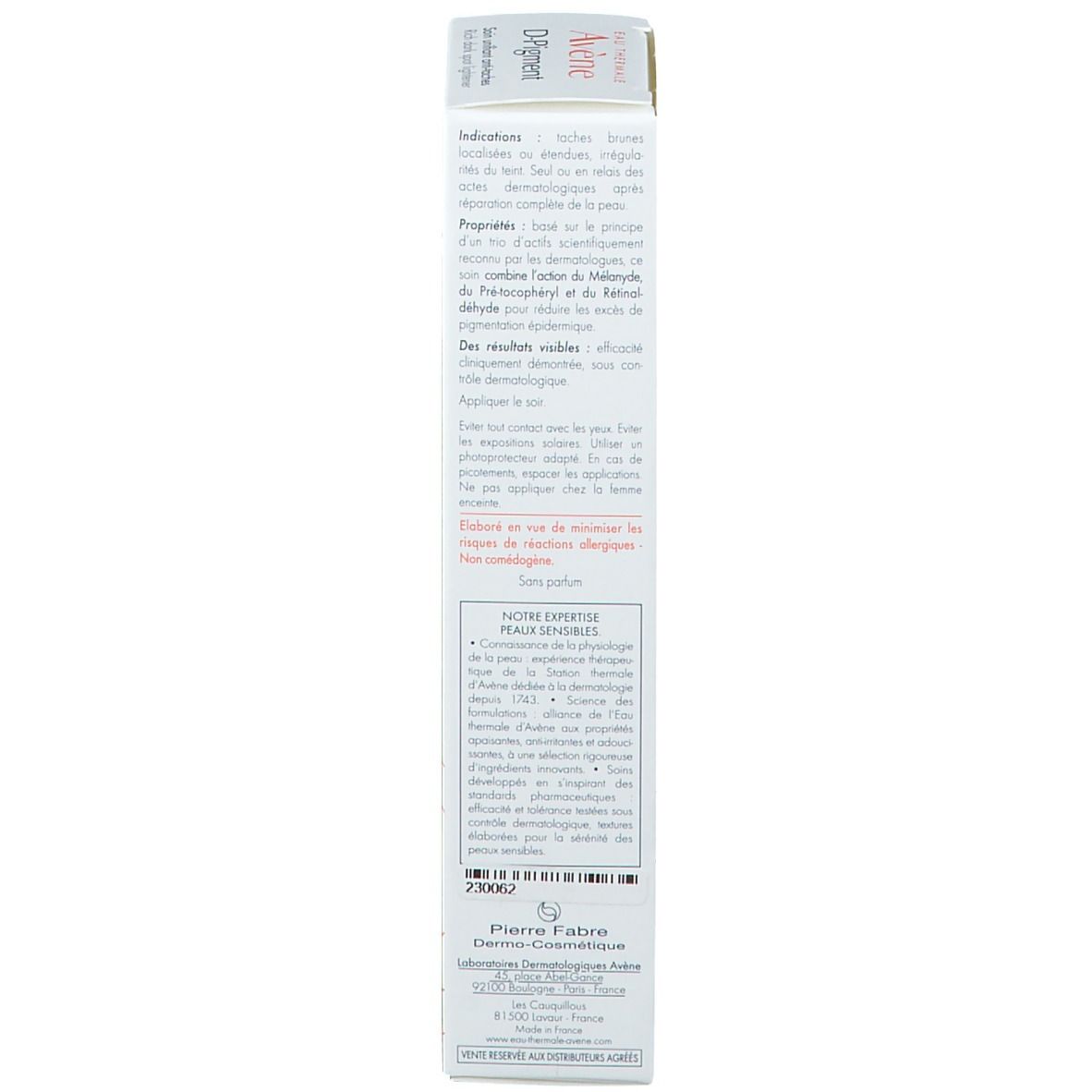 Dos de l'emballage du produit. Texte multilingue. Contient des informations sur le produit et le fabricant.