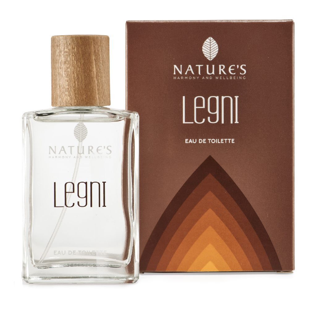 Flacone in vetro con tappo in legno e scatola. Scritta: Nature's Legni Eau de Toilette. Confezione marrone con sfumature.